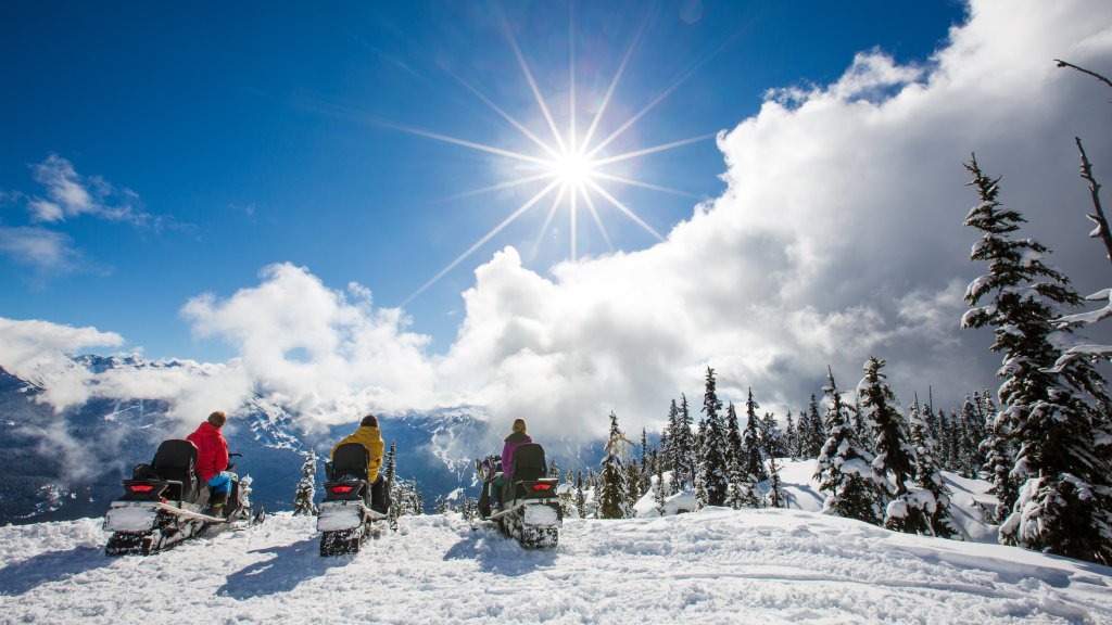 snowmobiling in the mountains
