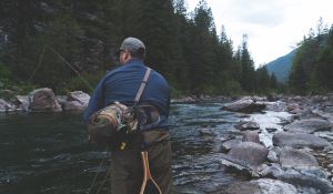 Man fly fishing in Whistler