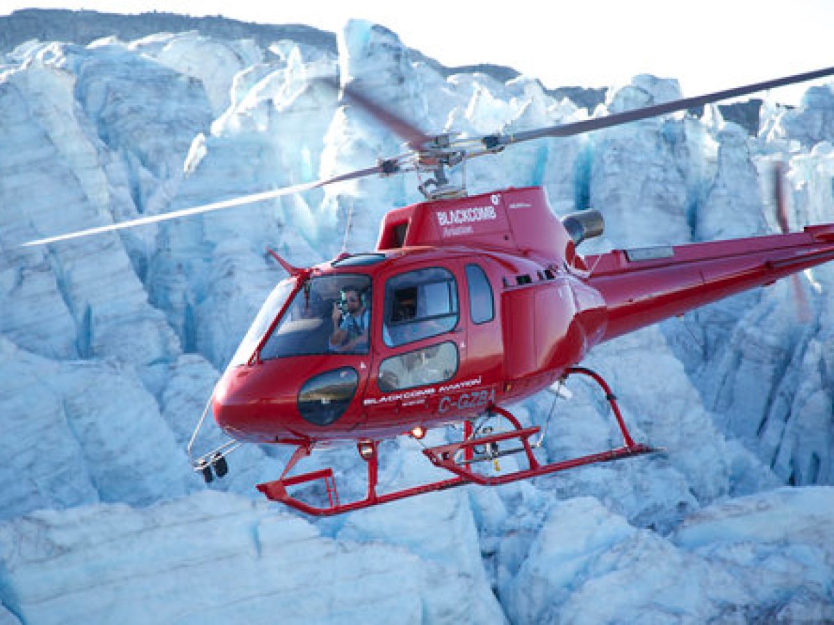 Blackcomb helicopter in front of a glacier