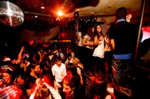 People dancing and celebrating at Maxx Fish in Whistler